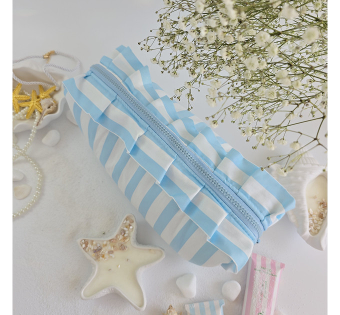Large sky-blue striped cosmetic bag with ruffles
