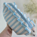 Large sky-blue striped cosmetic bag with ruffles