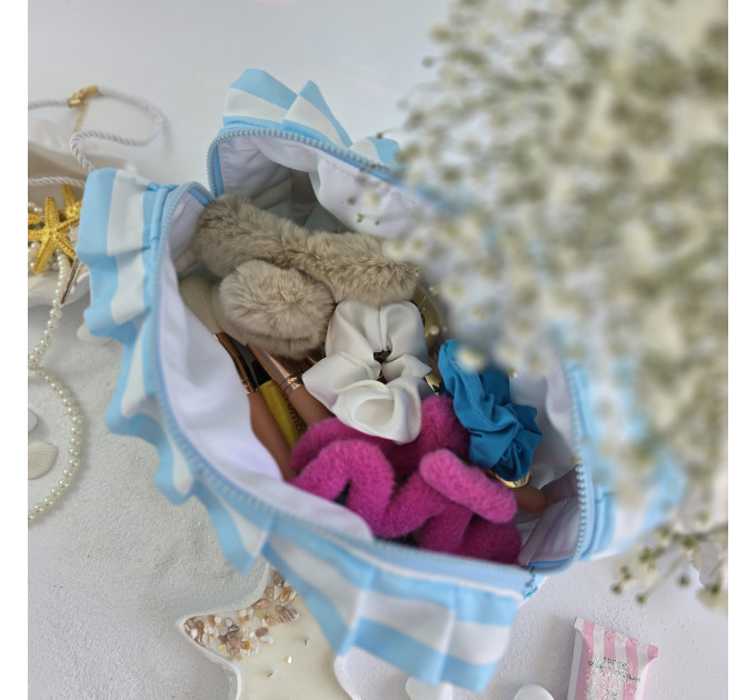Large sky-blue striped cosmetic bag with ruffles