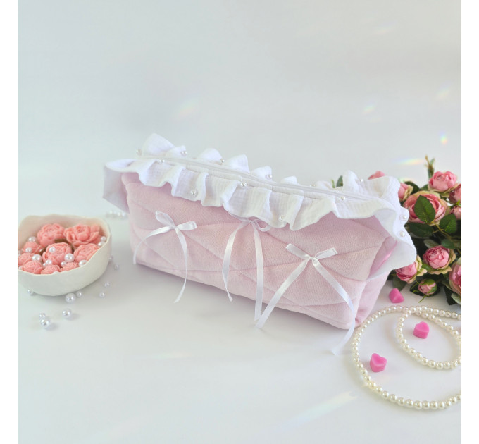 Large soft pink cosmetic bag with ruffles, bows and pearl-like beads
