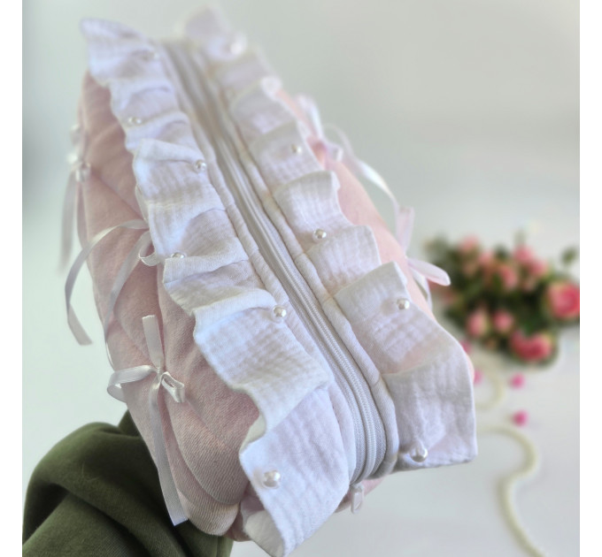 Large soft pink cosmetic bag with ruffles, bows and pearl-like beads
