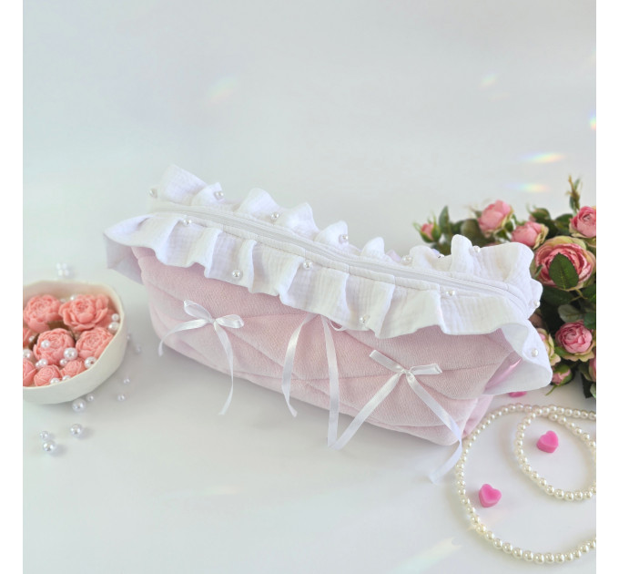 Large soft pink cosmetic bag with ruffles, bows and pearl-like beads