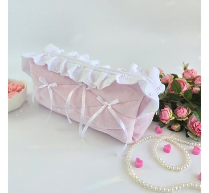 Large soft pink cosmetic bag with ruffles, bows and pearl-like beads