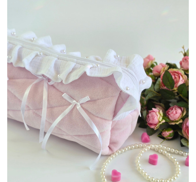 Large soft pink cosmetic bag with ruffles, bows and pearl-like beads