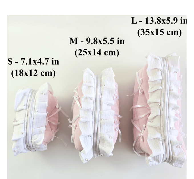 Large soft pink cosmetic bag with ruffles, bows and pearl-like beads