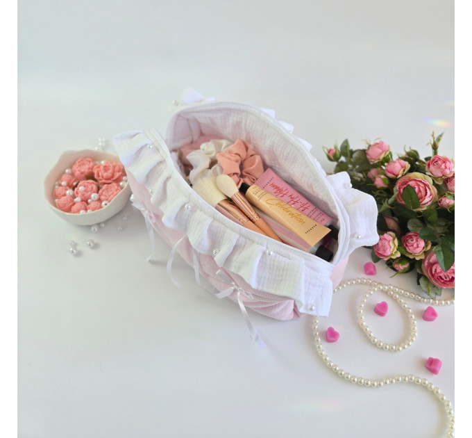 Large soft pink cosmetic bag with ruffles, bows and pearl-like beads