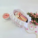 Large soft pink cosmetic bag with ruffles, bows and pearl-like beads