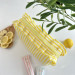 Large yellow striped cosmetic bag with ruffles