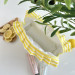 Large yellow striped cosmetic bag with ruffles
