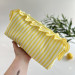 Large yellow striped cosmetic bag with ruffles