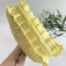 Large yellow striped cosmetic bag with ruffles