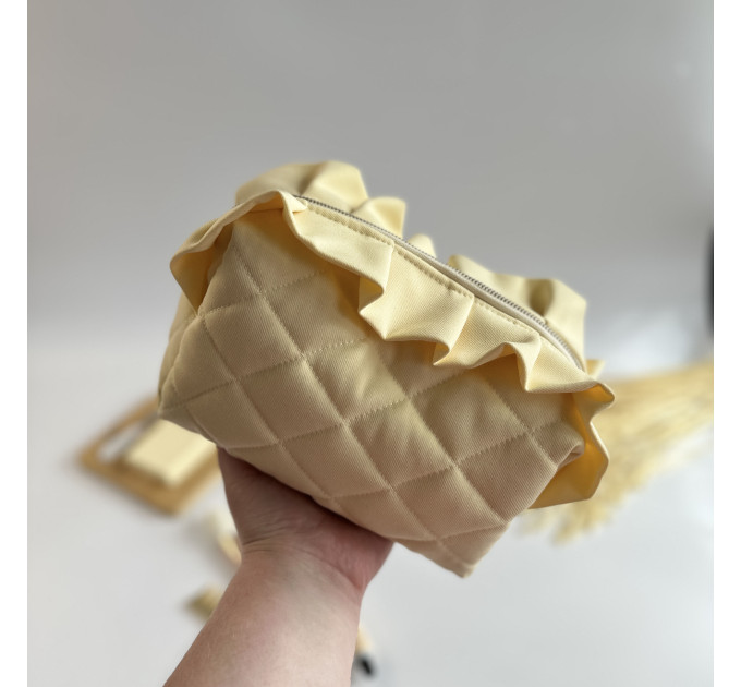 Medium butter yellow cosmetic bag with ruffles