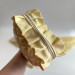 Medium butter yellow cosmetic bag with ruffles
