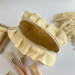 Medium butter yellow cosmetic bag with ruffles