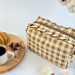 Medium checkered brown cosmetic bag with ruffles