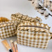 Medium checkered brown cosmetic bag with ruffles