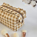 Medium checkered brown cosmetic bag with ruffles