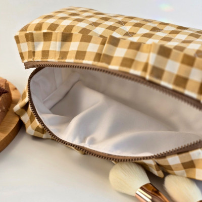Medium checkered brown cosmetic bag with ruffles