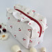 Medium cherries cosmetic bag with ruffles