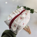 Medium cherries cosmetic bag with ruffles