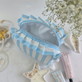 Medium sky-blue striped cosmetic bag with ruffles