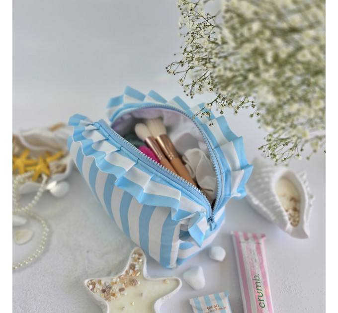 Medium sky-blue striped cosmetic bag with ruffles