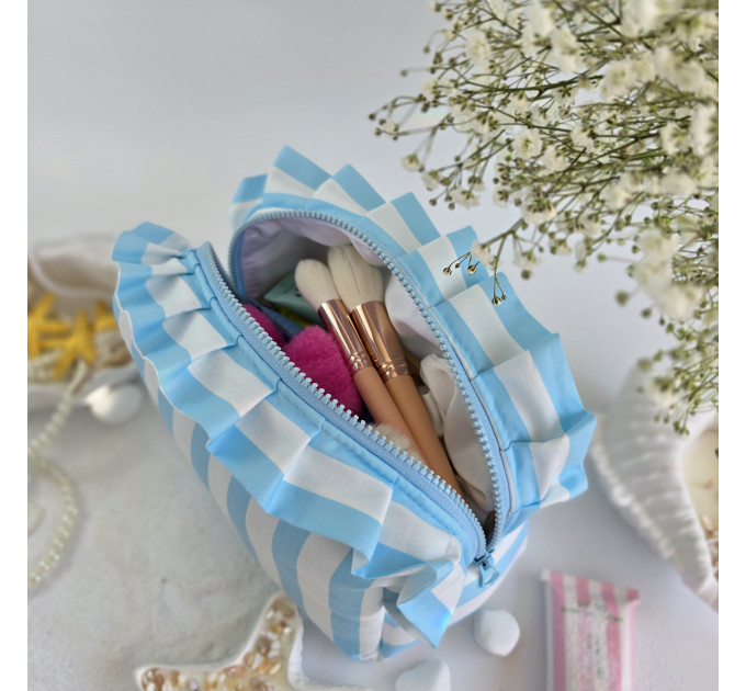 Medium sky-blue striped cosmetic bag with ruffles