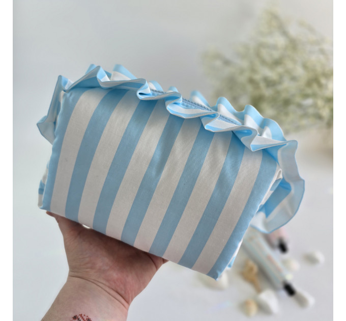 Medium sky-blue striped cosmetic bag with ruffles