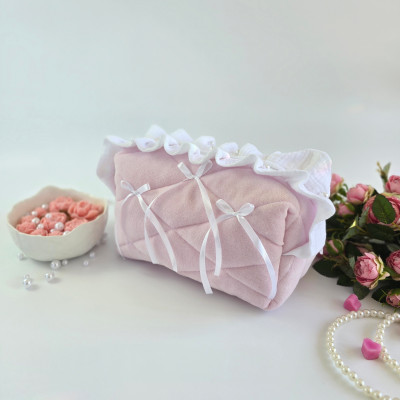 Medium soft pink cosmetic bag with ruffles, bows and pearl-like beads