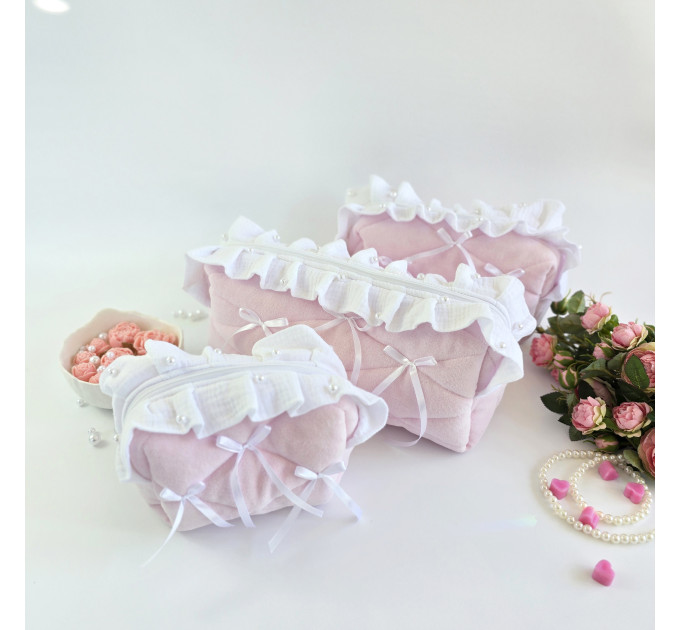 Medium soft pink cosmetic bag with ruffles, bows and pearl-like beads