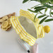 Medium yellow striped cosmetic bag with ruffles