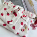 Strawberry book sleeve with ruffles on ties 