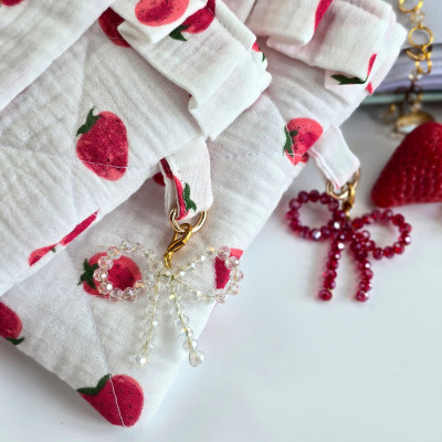 Strawberry book sleeve with ruffles on ties 