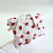 Strawberry book sleeve with ruffles on ties 