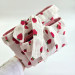 Strawberry book sleeve with ruffles on ties 