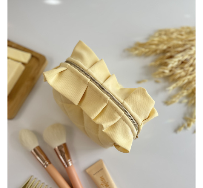 Small butter yellow cosmetic bag with ruffles