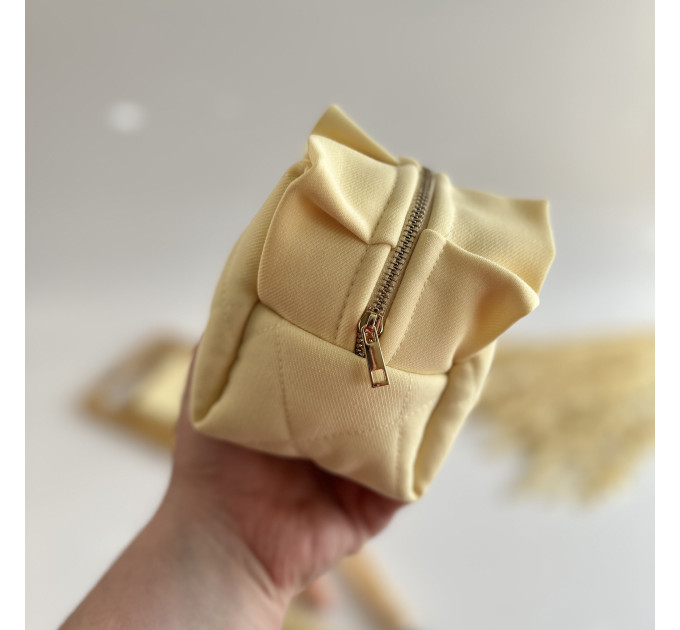 Small butter yellow cosmetic bag with ruffles