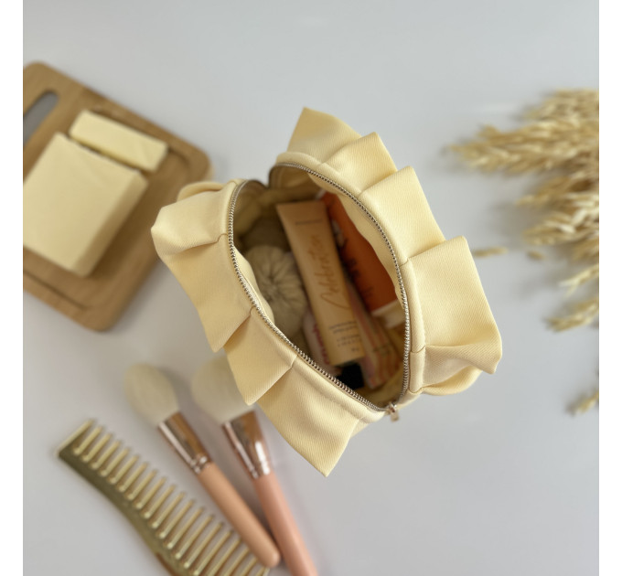Small butter yellow cosmetic bag with ruffles