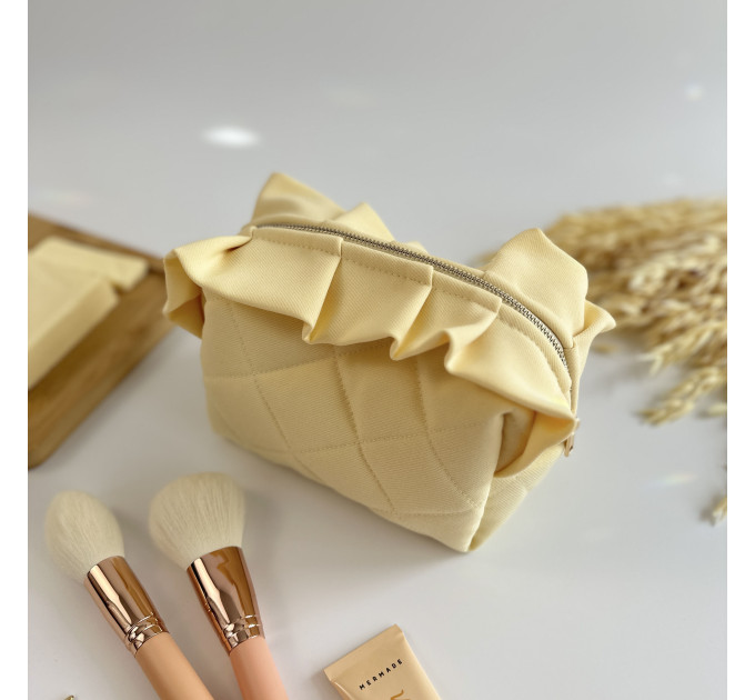 Small butter yellow cosmetic bag with ruffles