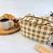 Small checkered brown cosmetic bag with ruffles