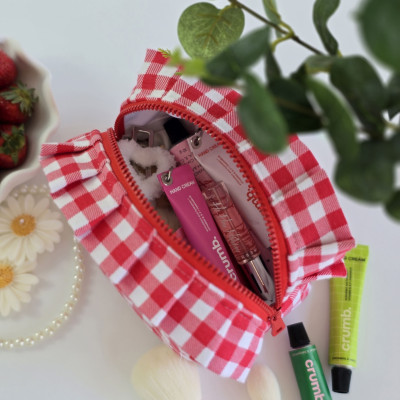Small red gingham cosmetic bag with ruffles