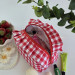 Small red gingham cosmetic bag with ruffles