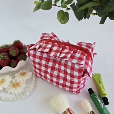 Small red gingham cosmetic bag with ruffles