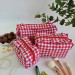 Small red gingham cosmetic bag with ruffles
