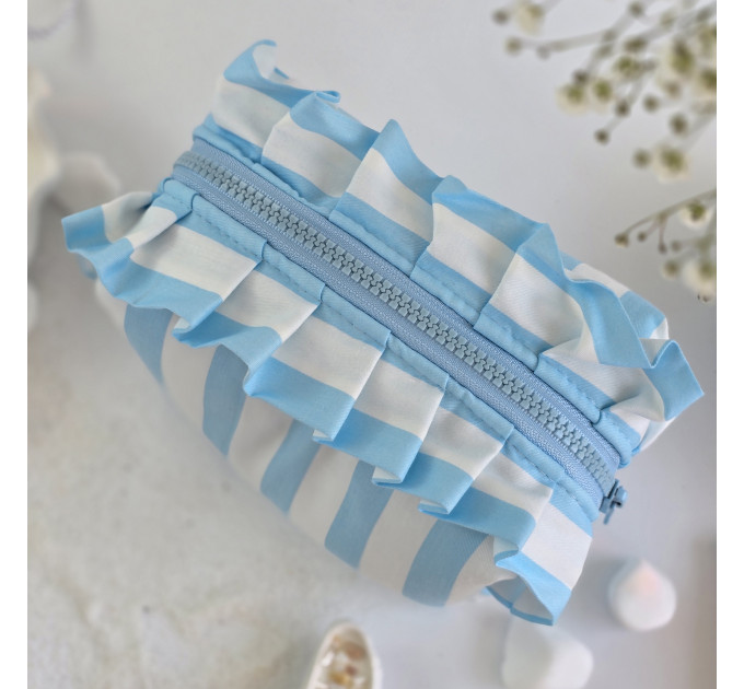 Small sky-blue striped cosmetic bag with ruffles
