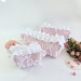 Small soft pink cosmetic bag with ruffles, bows and pearl-like beads
