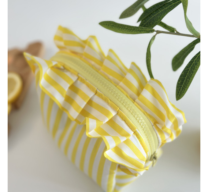 Small yellow striped cosmetic bag with ruffles