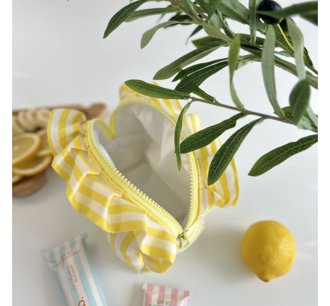 Small yellow striped cosmetic bag with ruffles