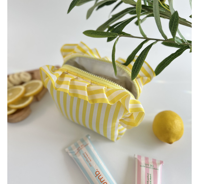 Small yellow striped cosmetic bag with ruffles