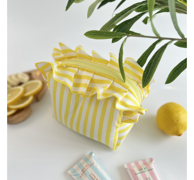 Small yellow striped cosmetic bag with ruffles